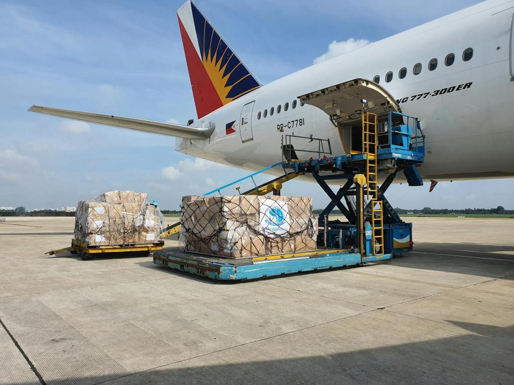 cargo being loaded onto an airplane at los angeles airport LAX by comex logistics llc